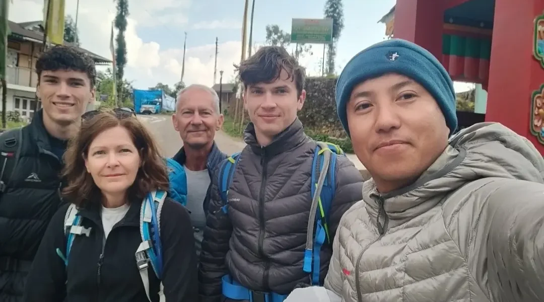 Kassang Bhtuia the travel operator of Zeal adventure having selfie with family tourist in yuksom town